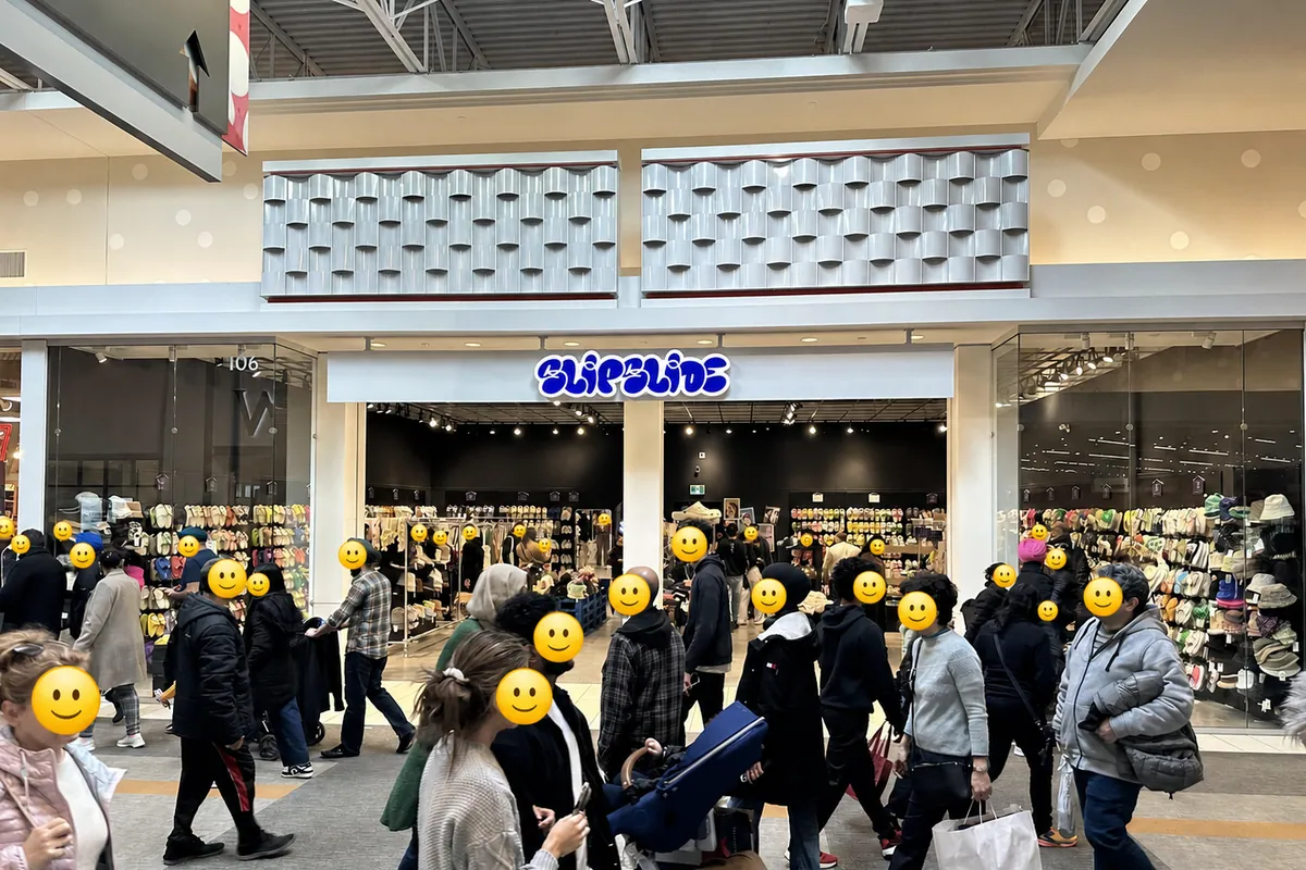 SlipSlide storefront on a lively shopping day